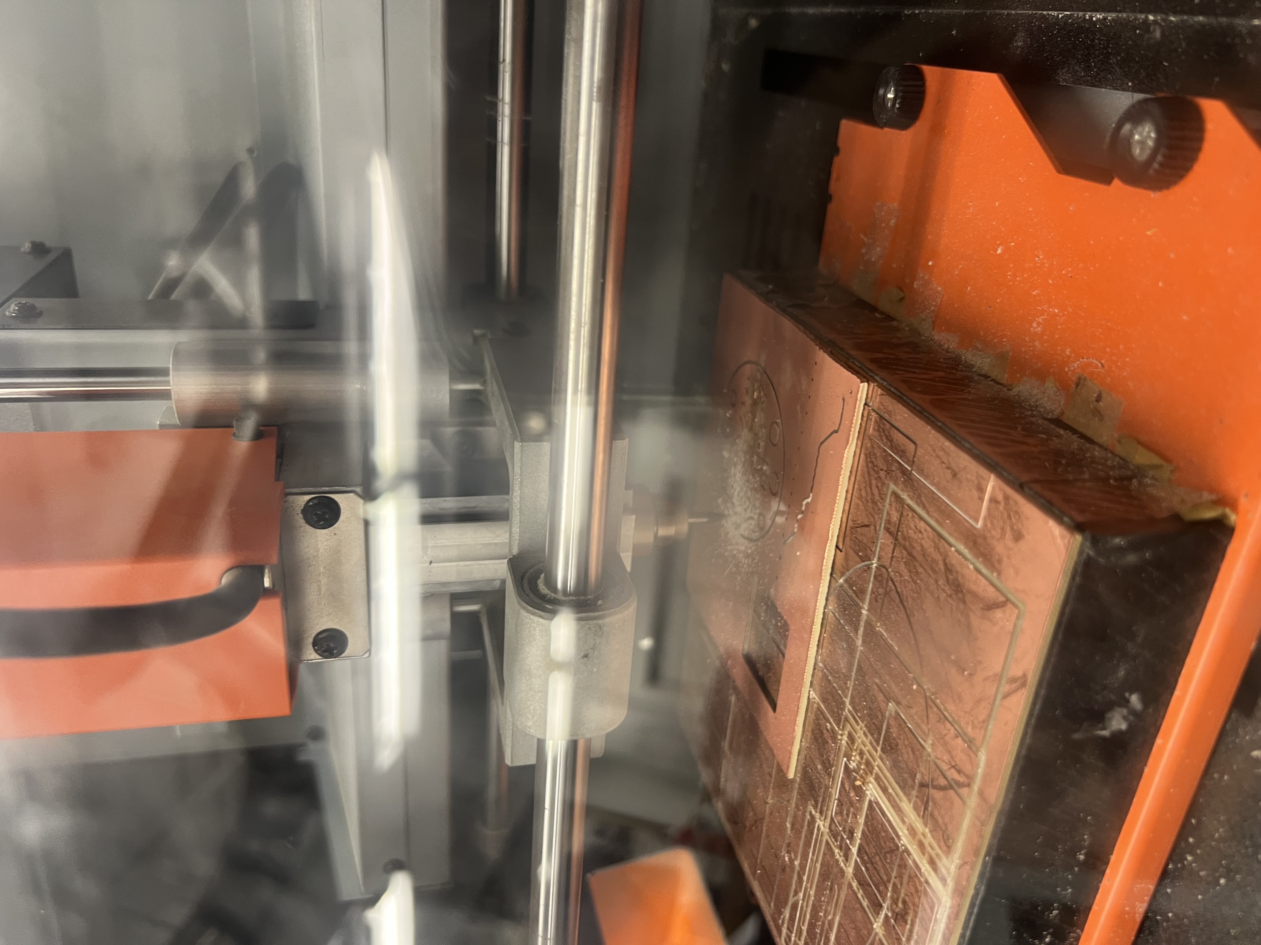 Live shot of the milling head cutting copper